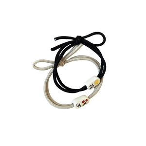 Elastic hair ties set with black and cream bands and decorative square resin beads