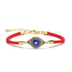 Adjustable red rope bracelet with colorful cubic zirconia evil eye pendant in gold finish