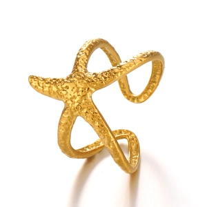 Minimalist golden starfish open ring with hammered texture for beach vacation style