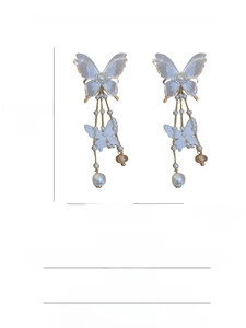 Detailed chart showing size and material specifications of long pearl butterfly earrings
