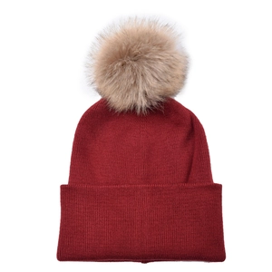 Unisex burgundy ribbed knit beanie featuring a large detachable faux fur pom-pom topper