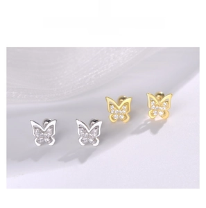 Detailed view of S925 silver butterfly earrings with sparkling cubic zirconia