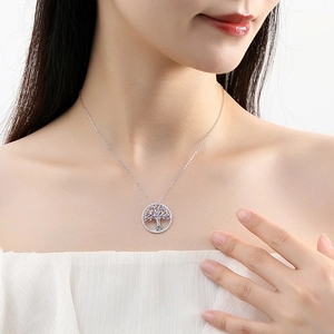S925 silver necklace featuring a life tree pendant with purple zircons on a female model