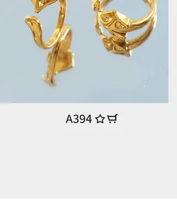 Close-up of 18K gold-plated snake chain bracelet with detailed fox head design charm