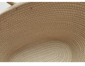 Close-up detail showing the intricate woven cotton rope texture of the beige beach tote bag