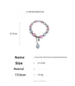Detail view of pink and opal beaded elastic bracelet with star pendant and zircon accents
