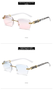 Close-up of rimless gradient sunglasses with gold engraved metal temples and marble texture
