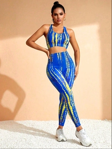Detail of blue and yellow tie-dye seamless yoga set featuring racerback top and leggings