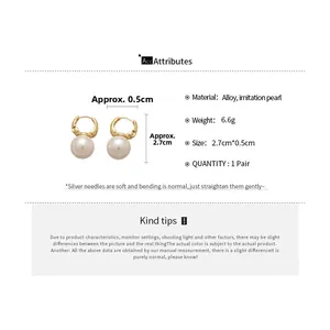 Detailed view of french vintage pearl earrings with dimensions and 6.6g weight info