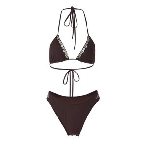 Detail of dark brown bikini top and bottoms featuring decorative white shell buttons