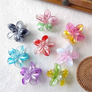 Colorful gradient plumeria flower hair claws set for beach vacations and hair styling
