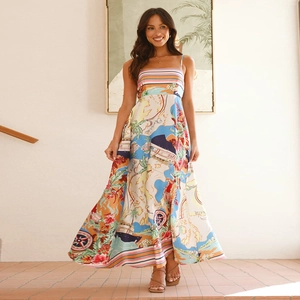 Detail of colorful holiday maxi dress with nautical map print and slim spaghetti straps