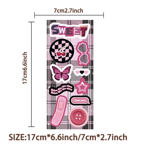 Detailed view of pink Y2K style stickers with sweet cherry and retro phone patterns