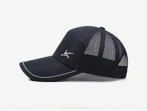 Detail view of the breathable mesh back and reflective trim on this navy baseball cap