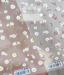Detail of floral nail art stickers TS-605 and TS-607 with daisy and leaf patterns