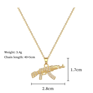 Detail of gold AK-47 necklace with size specs 2.8cm pendant and 40cm chain