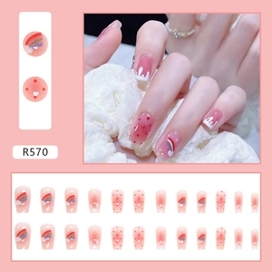 Rainbow press-on nails set R570 featuring pink gradient base and cute red polka dots
