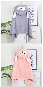 Detail of coral fleece baby hooded bathrobe showing animal ears and soft texture