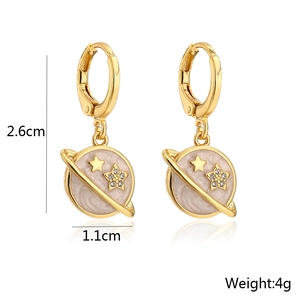 Detail view of gold-plated planet earrings with beige enamel and zircon, height 2.6cm