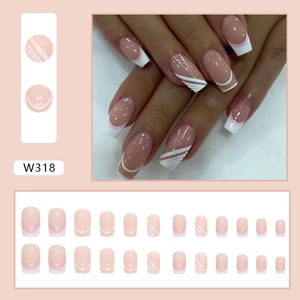 Medium length square press-on nails in nude with white French tips and geometric lines