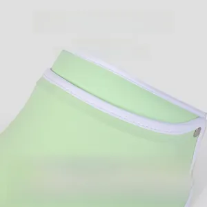 Detail of adjustable brim and cooling ice silk fabric on light green sun visor hat