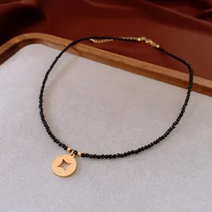 18K gold plated beaded necklace featuring a celestial starburst round medallion pendant