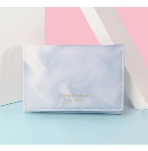 Detail of blue and white marble pattern on premium slim synthetic leather wallet