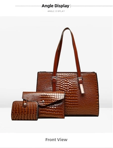 Three-piece set featuring large crocodile pattern tote bag, envelope clutch and wallet