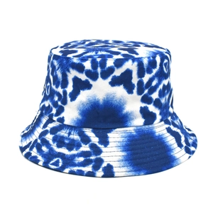 Blue and white tie-dye cotton bucket hat with a stylish reversible sun protection design