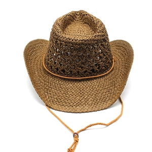 Ethnic hollow straw cowboy hat in dark brown with breathable weave and windproof chin strap