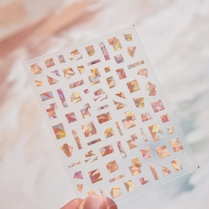 Detail of TO4577 nail stickers with holographic shell texture and geometric shapes