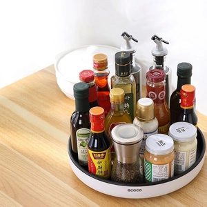 Rotating kitchen spice rack organizer with 360-degree lazy susan tray for bottles