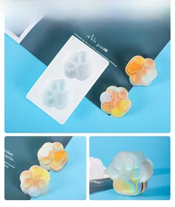 Detail of dual-hole cat paw silicone mold with frosted gradient resin craft pieces