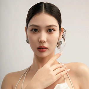 Modern woven texture silver earrings with high-gloss metallic finish in 18K gold style