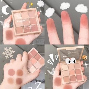 Nine-color eyeshadow palette arm swatches in nude and rose tones with matte textures