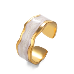 Adjustable wavy gold ring with white pearlescent inlay and modern minimalist style