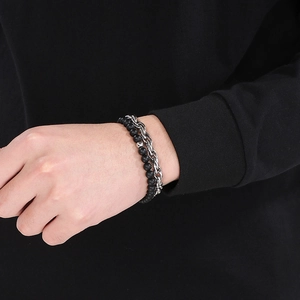 Men's matte black onyx beads and silver chain bracelet set shown on model's wrist