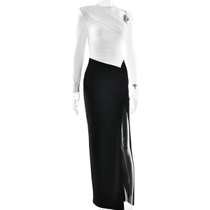 Detail view of white one-shoulder sleeve with elegant pleats and slim fit dress