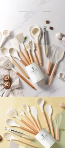 Close-up of 14-piece beige silicone cooking utensils with ergonomic wooden handles