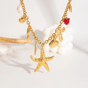 Gold stainless steel starfish heart charm bracelet with sea shells and pearls on stones
