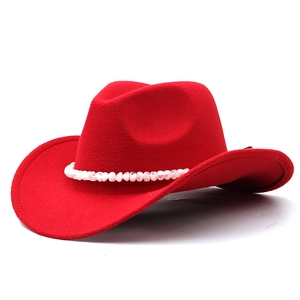 Detail of red wool cowboy hat with distinctive white crushed stone bead band decoration