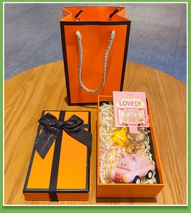 Pink pig car keychain with star charm in luxury orange gift box and matching bag