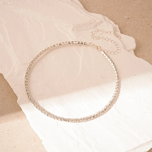 Close-up of sparkling multi-row rhinestone choker necklace with adjustable lobster clasp