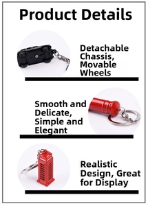 Detail view showing London red telephone booth and black car keychain with movable tires