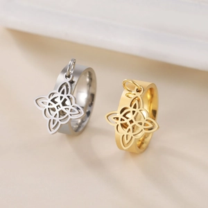 Minimalist stainless steel witch knot dangle ring set in polished gold and silver finish