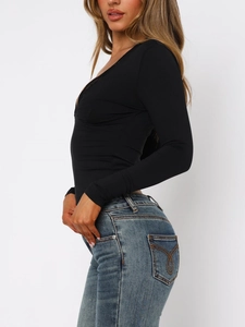 Detail view of V-neck lace trim and slim fit black long sleeve ribbed autumn t-shirt
