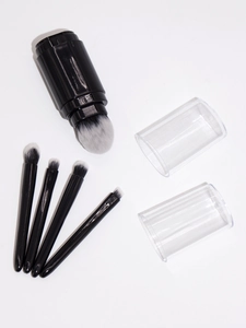 Detail view of 5-in-1 retractable makeup brush set with black handles and gradient bristles