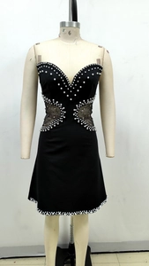 Detail of black strapless mini dress with pearl butterfly pattern and mesh side panels