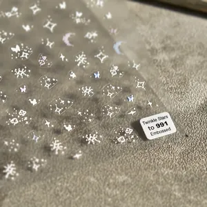 5D embossed nail stickers featuring twinkling stars, moon, and butterfly designs