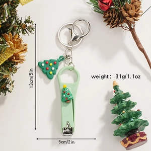 Christmas tree nail clipper keychain with dimensions 13cm length and 31g weight